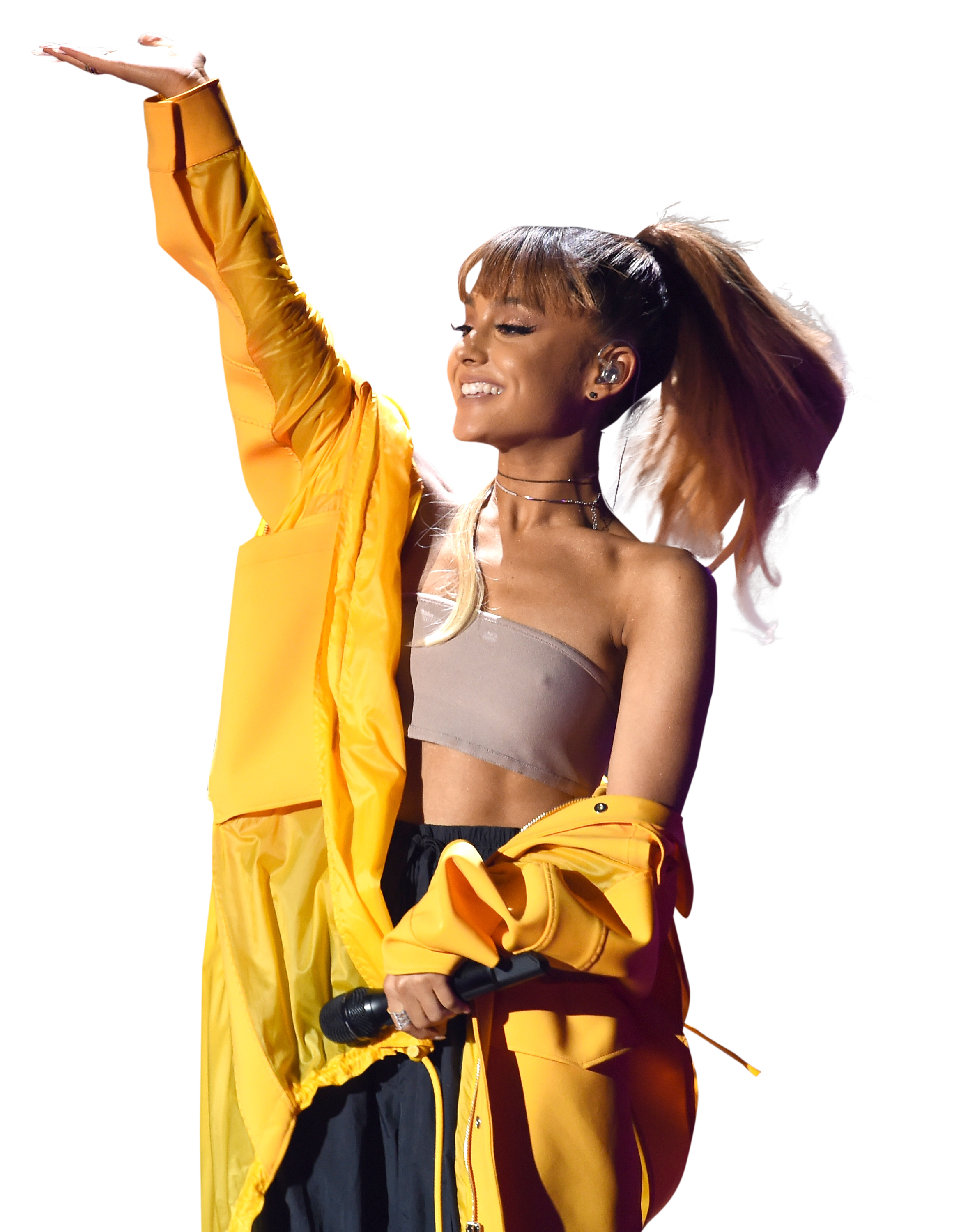 Ariana Grande in yellow dress on stage PNG Image - PurePNG 