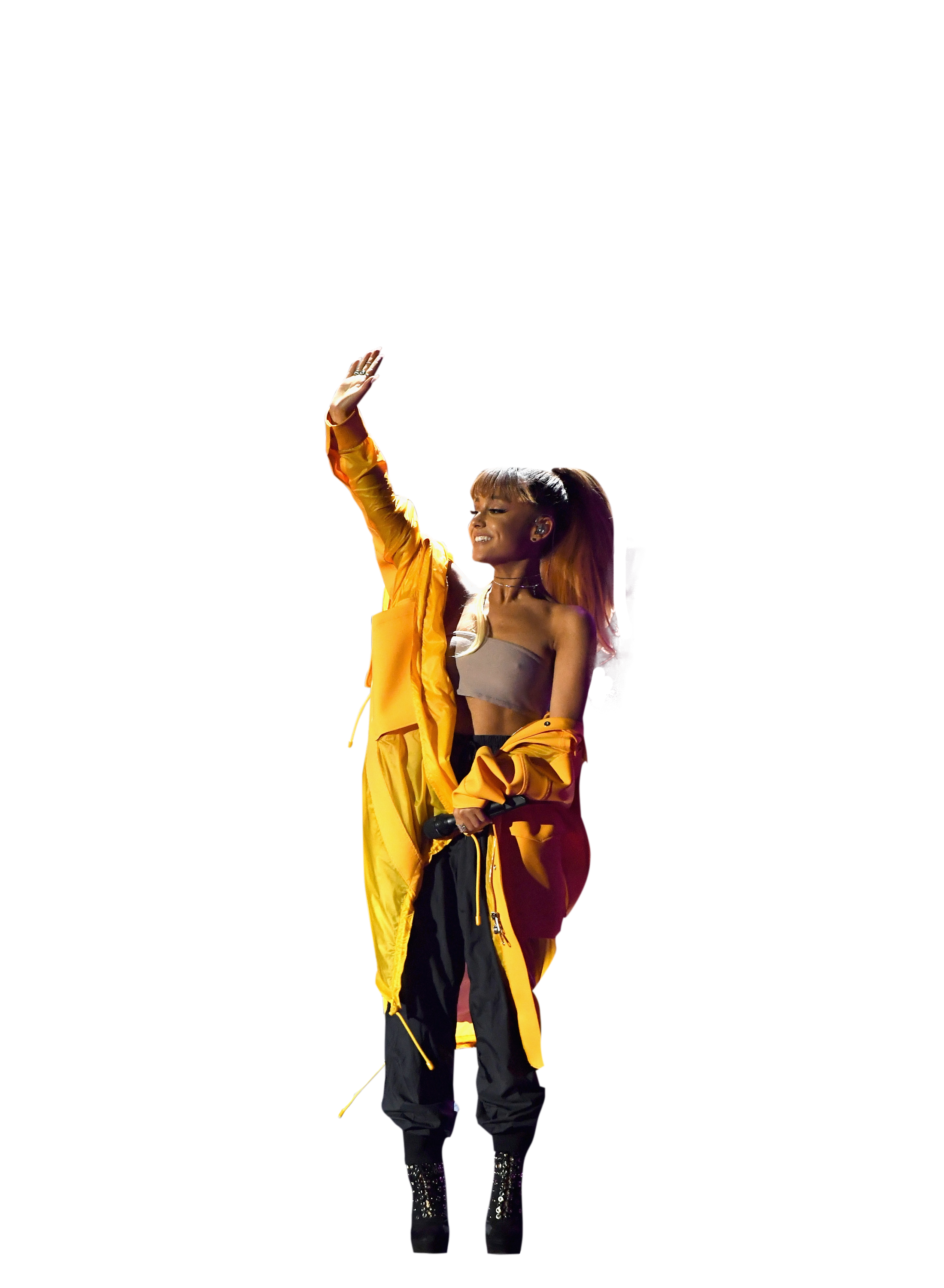 Ariana Grande in yellow dress on stage PNG Image