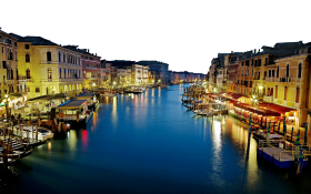 Deep Blue Sea and Lighted Buildings - Italy